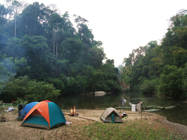 Camping on a river bank sand beach on the trip to Thilorlay waterfall, Umphang