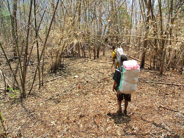 Karen tribal porters on a jungle hike