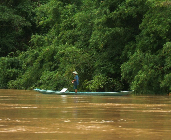 Another fisherman on the Mekong river in northern Laos