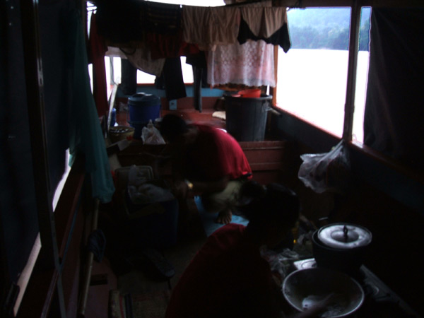 Cooking dinner on the Mekong boat, northern Laos
