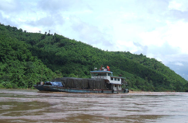A Chinese cargo boat on Mekong river between Laos and Myanmar