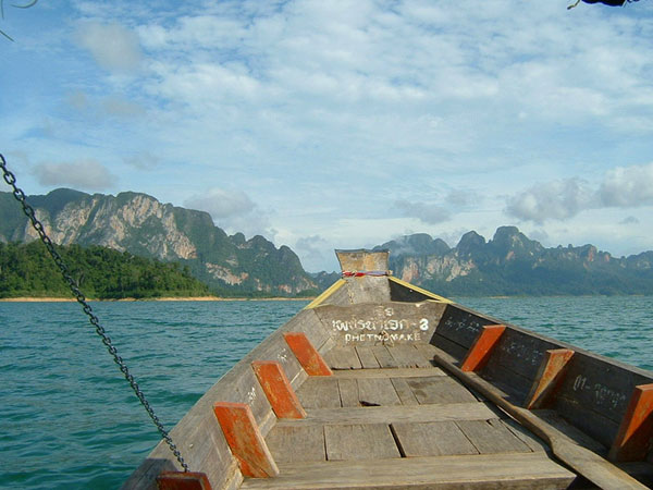 Travelling in a boat on Cheow lan lake, southern Thailand